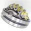High quality self-aligning spherical roller bearing 22211 CAK