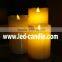 Movable flame wick candles