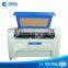 Small Cutter Cnc Co2 60w 50w Chipboard Abs Shirt Fabric Cloth Acrylic Sheet Laser Cutting Engraver Machine For Sale