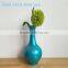 Narrow-mouth ceramic flower vase from a factory