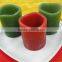 small colorful wax led votive candle with crater