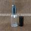 1 oz Clear Boston Round Glass Bottle with Black Fine Mist Spray