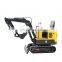 Mini digger crawler excavator in garden and solar farm