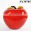 Small orange glazed ceramic pear shape fruit decoration