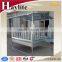 Livestock hay feeder for cattle and horse corral feeder with roof