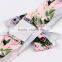 Red christmas ribbon bow with adhesive tape