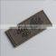Hot Sell custom machine embossed pu leather labels Jeans With Letter Logo