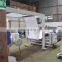 UTHQA4 Automatic 2 Stand Unwinding Roll A4 Copy Paper Sheeting Machine With Overwrapping Equipment