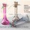 Various colored tall glass bottle vase