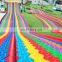 Children park items customized colorful rainbow dry snow slide for sale