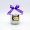 glass candle jar with color ribbon