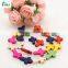 Assorted color turquoise cross beads