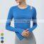 Asymmetrical Hem Design Yoga Top Gym Fitness Top Long Sleeve Thumb Holes Sports T Shirts Women Yoga Shirt With Removable Pad