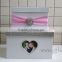 The money box with heart shape photo frame in handmade