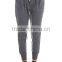 Women deep flowers grey trousers