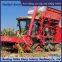 Corn harvester modified with triangular track wheels for anti slip in flooded areas