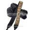 Gold and silver camera shoulder neck strap