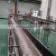 High friction slat chain conveyor line with anti-slip rubber for uplifting material handling