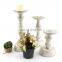 custom white color tall elegent delicate wedding candlestick in glass with candles