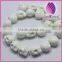 Bead porcelain white 13x11mm skull.