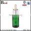  china cosmetic packaging essential oil 100ml dropper bottle beautiful high quality green glass dropper bottle wholesale
