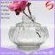 Round clear glass aroma diffuser bottle in lantern shape with vertical stripe and color spraying is available
