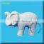 unpainted ceramic elephant figurine