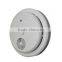 conventional battery powered photoelectric smoke alarms