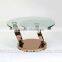Glass top table with stainless steel leg