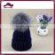 Acrylic knitted beanie with fox fur pom