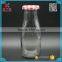 wholesale drinking glass milk bottles with metal lids 320ml