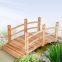 wooden garden pond bridge