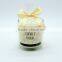glass candle jar with color ribbon