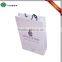 Custom fashionable white kraft paper shopping bag