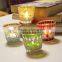 Handmade cup shaped glass mosaic candle holder