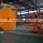 Two arms shuttle rotomolding machine for manufacturing plastic products