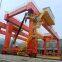Upper rotary rail mounted container gantry crane