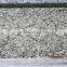 China spray white granite tile prices