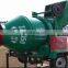 Concrete mixer drum machine with lift ladder An elevating concrete mixer for construction