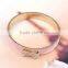 China wholesale gold plated jewelry zinc alloy rhinestone bowknot bangle for girls