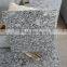 China spray white granite tile prices