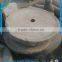 old millstone table grinding stone with wheel