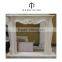 Interior fireplace mantel design with people sculpture