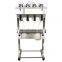 Perfume Filling Machine Penumatic Liquid Filling Machine Vacuum Liquid Filler Four Head