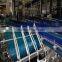 water industry straight running plastic chain conveyor line