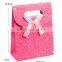 Fastener bow pink plastic bag gift design