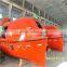 Marine totally enclosed lifeboat with safety belt