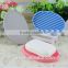 Pink silicone soap frame elliptic by the washbasin