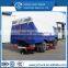 vacuum road sweeper truck with sweeping brushes