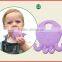 Baby's teething toothbrush with suction stand